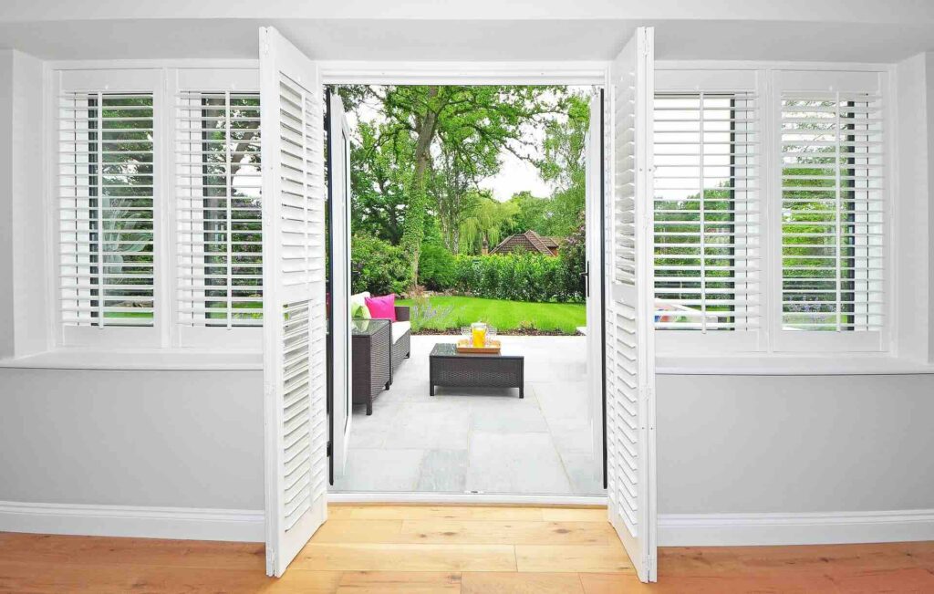 White patio door shutters - FAS Exteriors