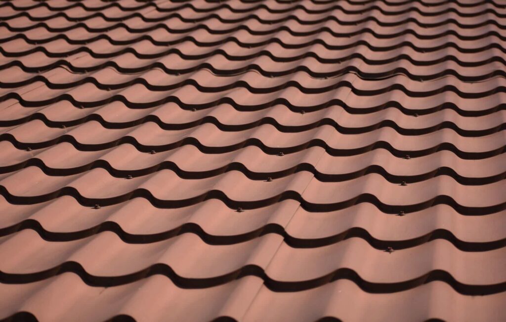 Red clay tiles on roof - FAS Exteriors
